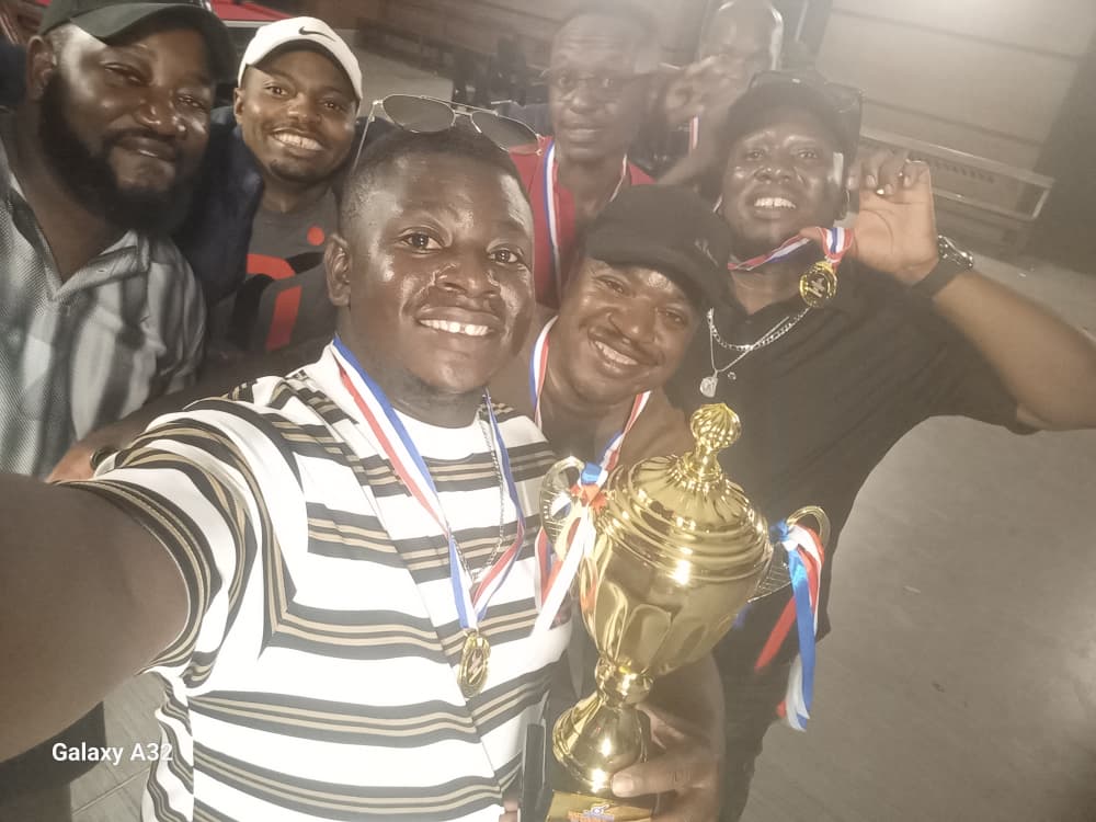 The Tyflex pool team celebrating with the 1st place trophy and medals at the Zimpapers Battle of Brands 2026